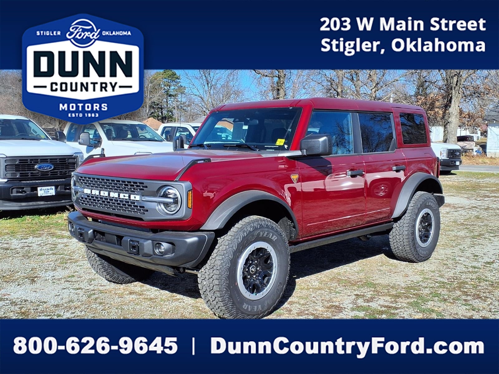 2025 Ford Bronco Badlands in Ruby Red Metallic Tinted Clearcoat — front three-quarter view